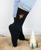 Socken mit Rentier und Weihnachtsmütze